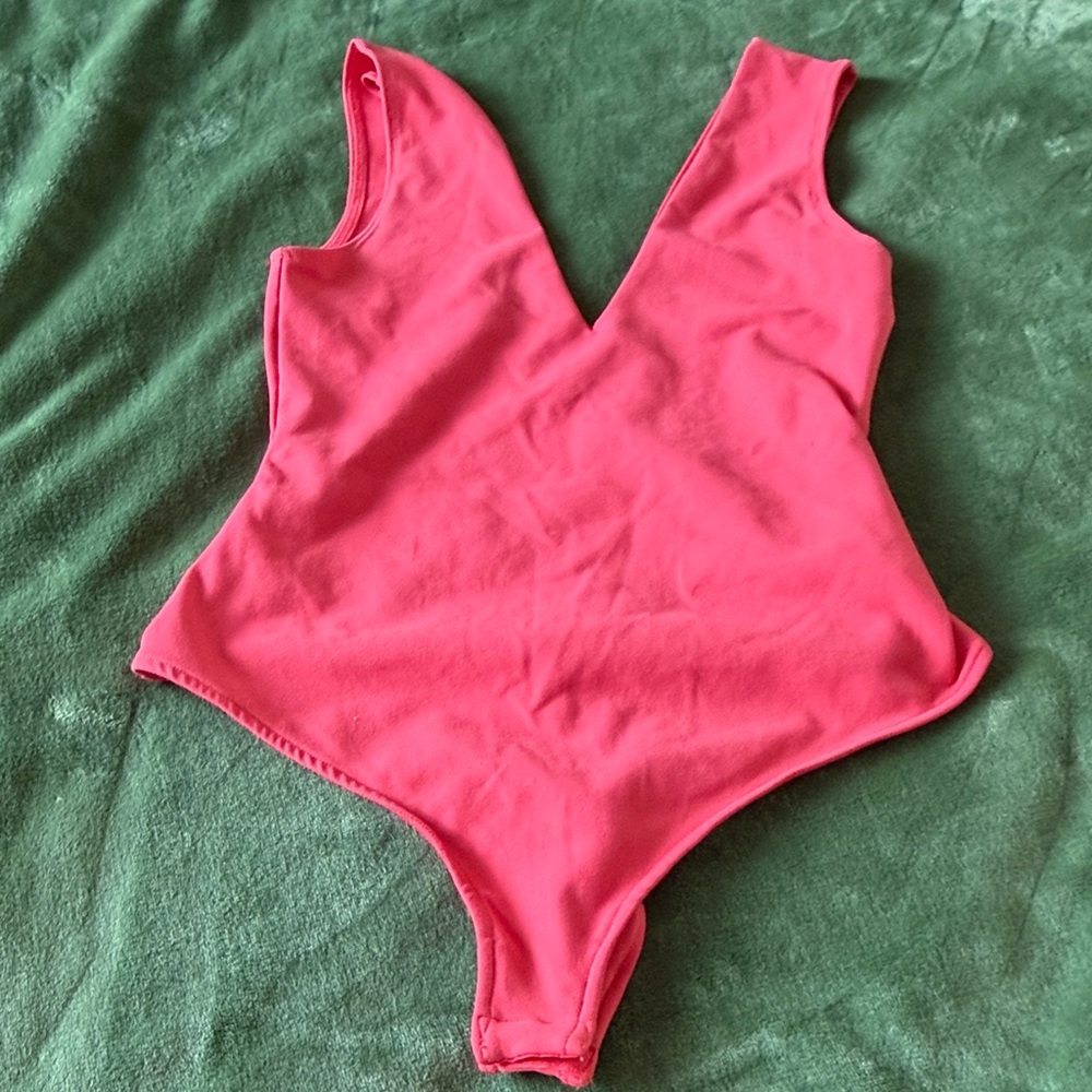 FP Movement by Free People Pink Bodysuit excellent condition